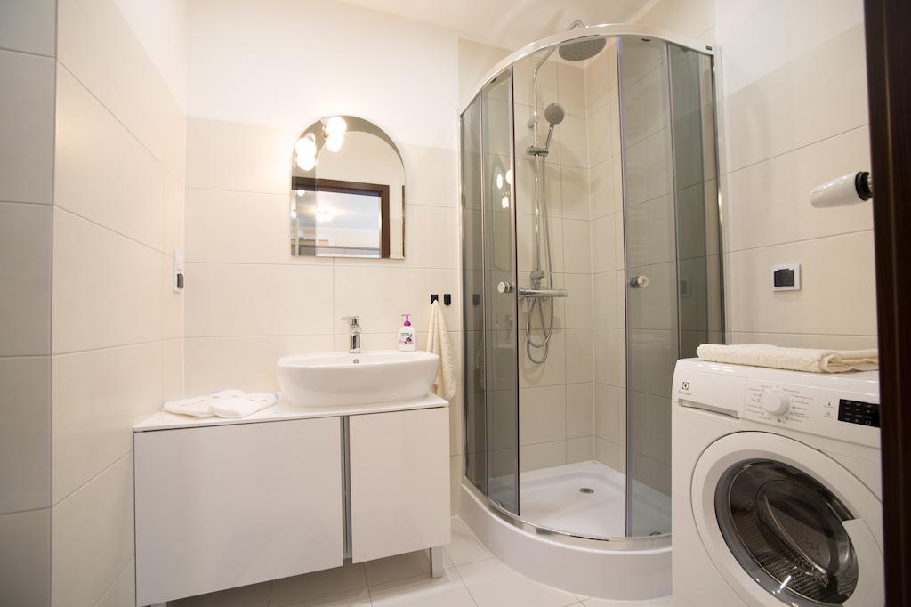 Sloneczny Apartament Lötzen Zimmer foto